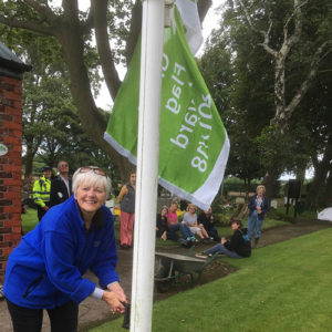 Chair of the Friends group raises the 2017-2018 Green Flag, making it the 6th year on the run - July 2017.