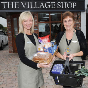 Proud Manager Julie and one of the many kind shop volunteers.