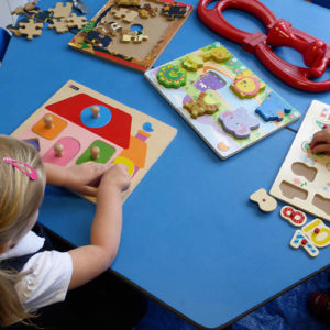 Table-top toys engage children's hand-eye coordination and develop mathematical skills.