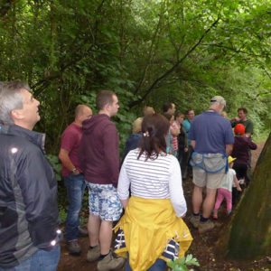 The Claypits Ranger tells visitors about the different varieties of trees and shrubs flourishing in the woodland.