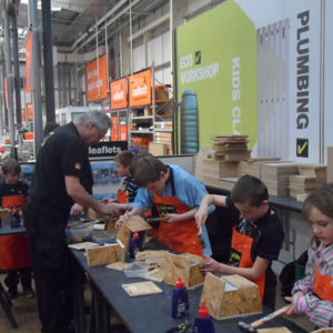 Cubs enjoying a practical workshop at B & Q - April 2013.