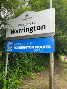 WBC sign on A57 after cut back and cleaning - June 2025